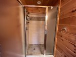 Second main floor bathroom with a large shower stall 